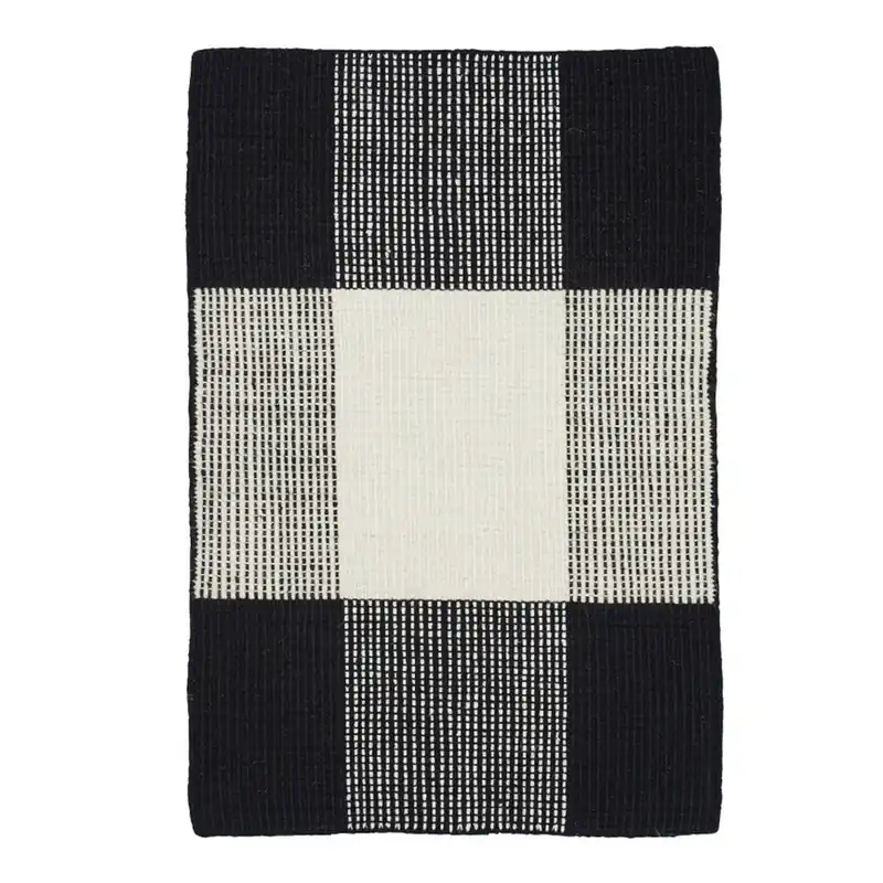 Czarno-biały dywan wełniany ręcznie tkany Linie Design Bologna, 50x80 cm Bonami Zniżka