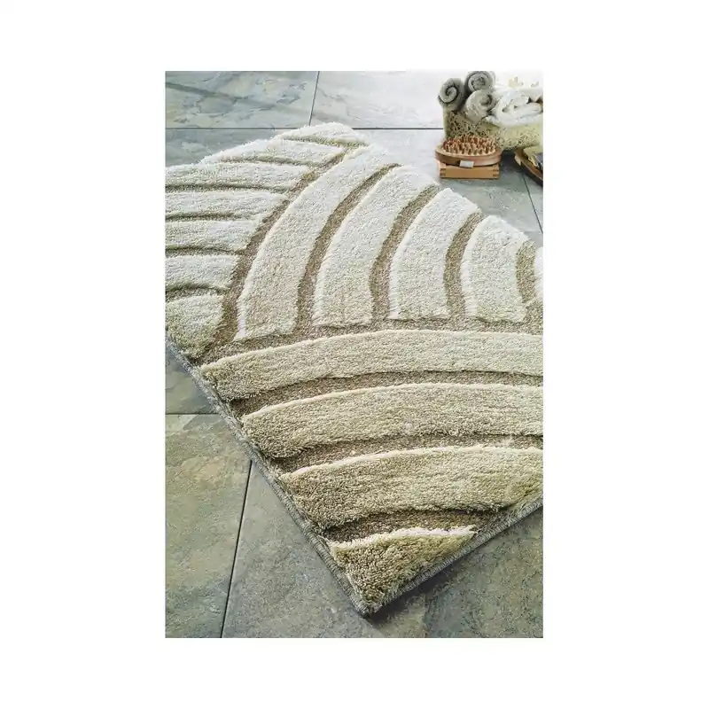 Kremowy dywanik łazienkowy Confetti Bathmats Karya, 70x120 cm Bonami Bestseller