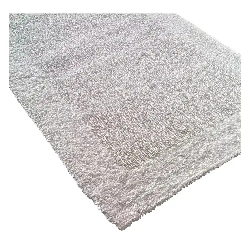 Biały dywanik łazienkowy Confetti Bathmats Natura Heavy, 70x120 cm Bonami Bezpieczne zakupy